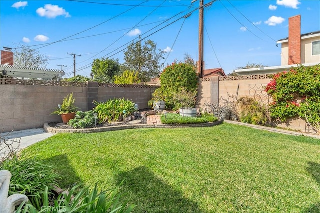 view of yard with a pergola