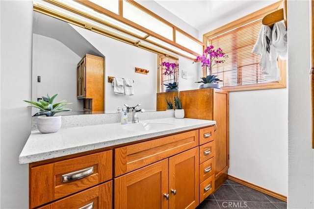 bathroom featuring vanity and tile patterned flooring