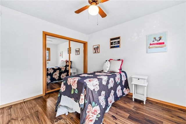 bedroom featuring ceiling fan and dark hardwood / wood-style flooring