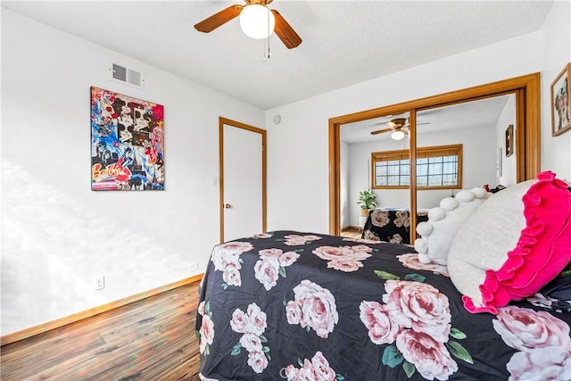 bedroom featuring ceiling fan and wood-type flooring