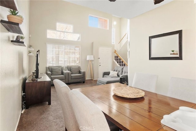 dining area featuring carpet