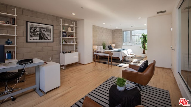 office space with light hardwood / wood-style flooring