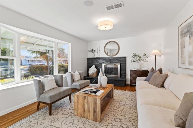 living room with light hardwood / wood-style flooring