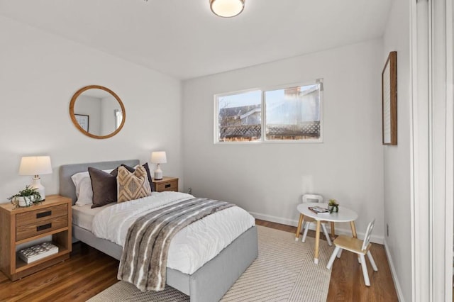 bedroom with hardwood / wood-style floors