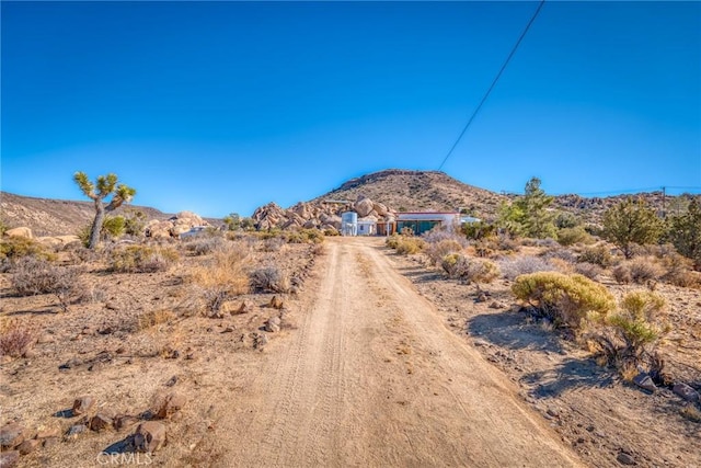 property view of mountains with a rural view