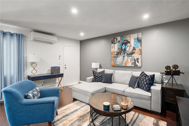 living room featuring dark hardwood / wood-style floors and a wall mounted air conditioner