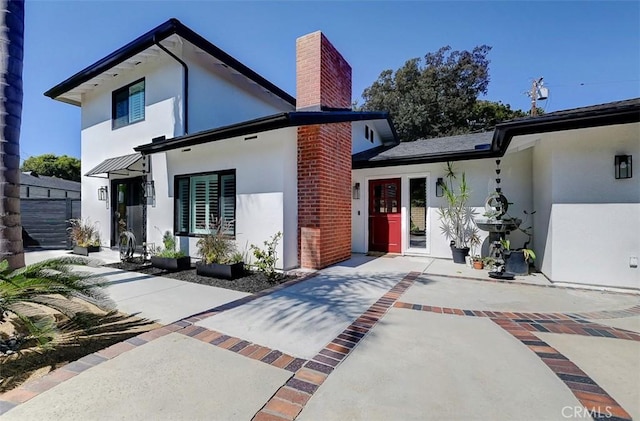 view of front facade with a patio