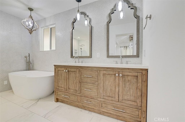 bathroom featuring a bathtub and vanity