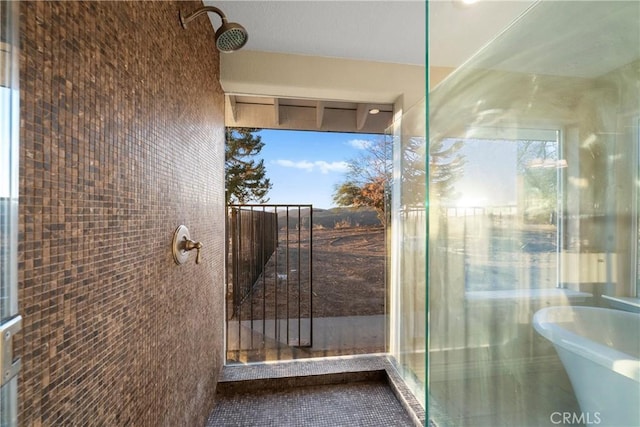 bathroom with a tub to relax in