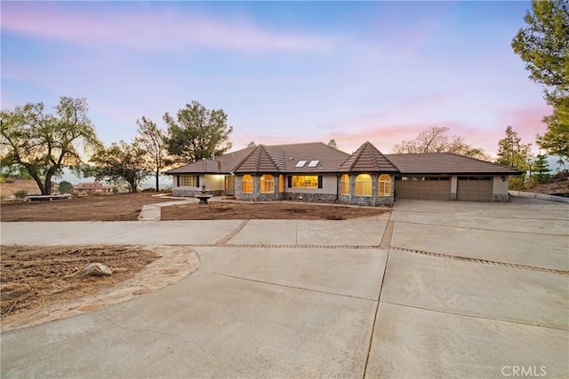 view of front of home with a garage