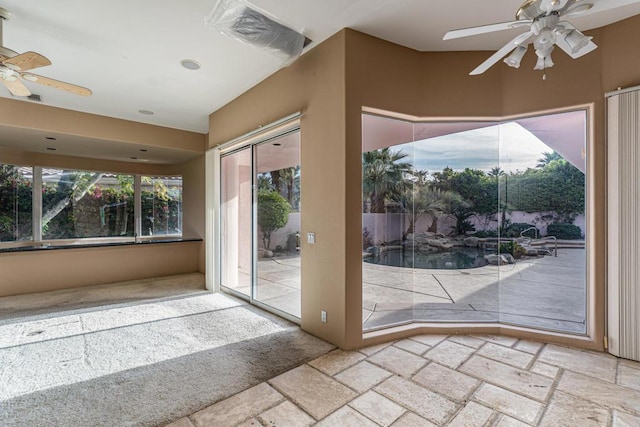 entryway with ceiling fan