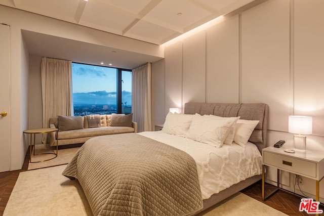 bedroom featuring dark parquet floors