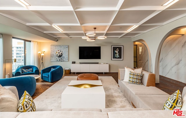 living room with beam ceiling, parquet floors, and coffered ceiling