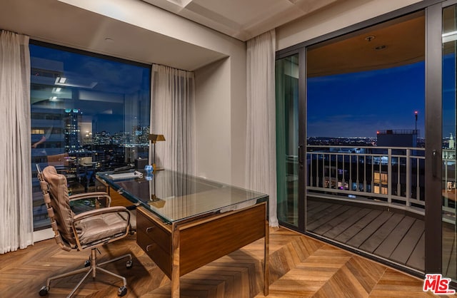 home office featuring parquet flooring