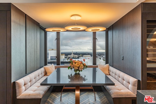 dining room featuring breakfast area and parquet floors