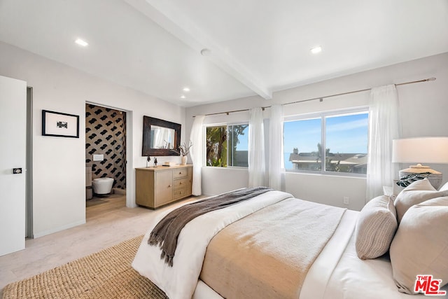 bedroom featuring beamed ceiling