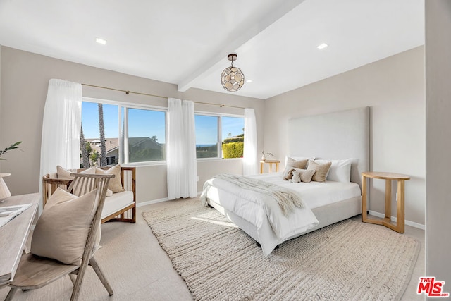 bedroom with beam ceiling