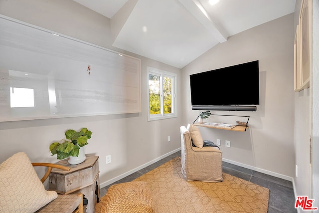 living area featuring vaulted ceiling