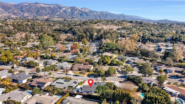 drone / aerial view featuring a mountain view