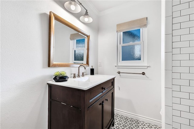 bathroom featuring vanity and crown molding