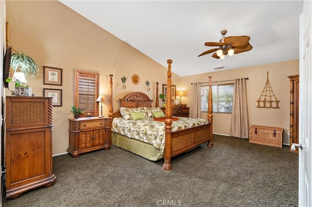 bedroom with dark colored carpet, lofted ceiling, and ceiling fan