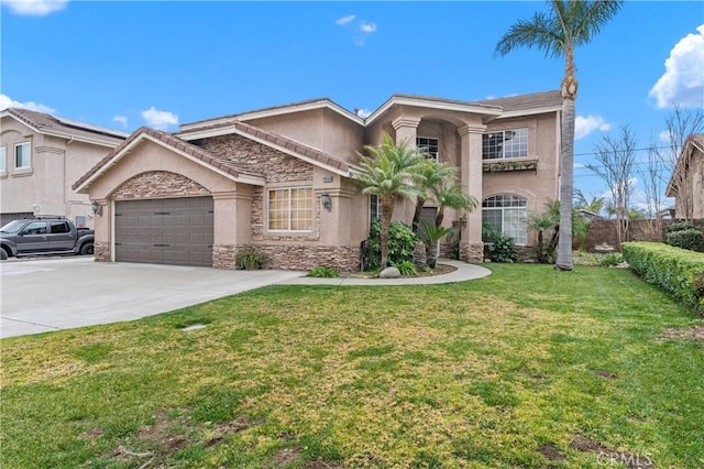 view of front of property featuring a garage and a front lawn