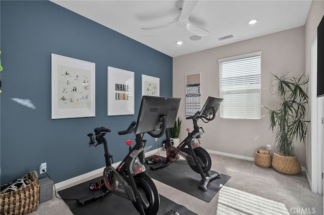 exercise room featuring carpet floors and ceiling fan