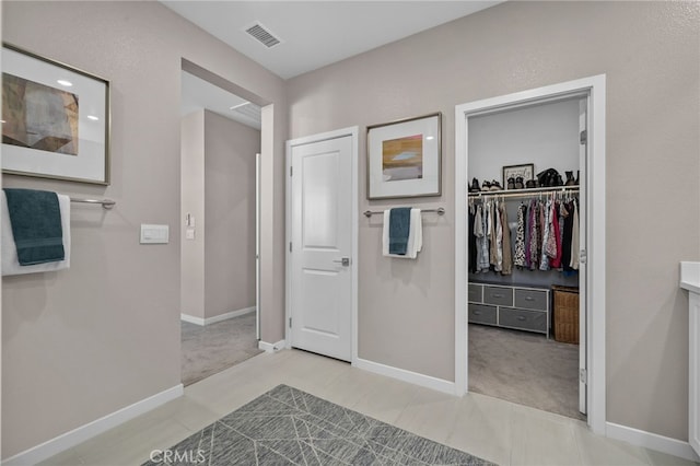 bathroom with tile patterned flooring