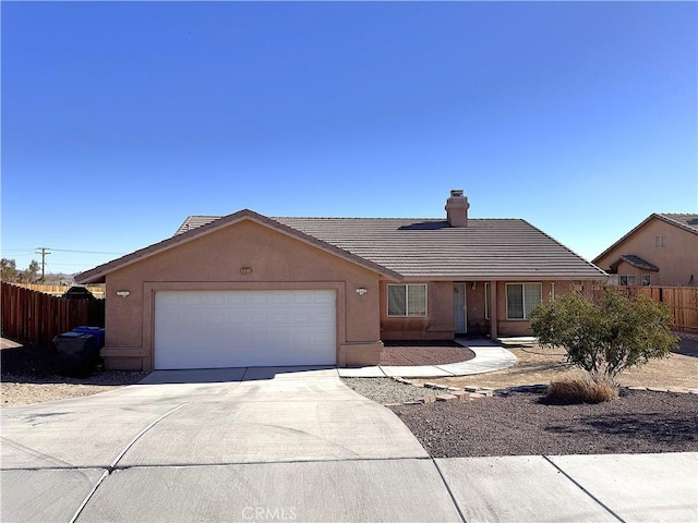 ranch-style home featuring a garage