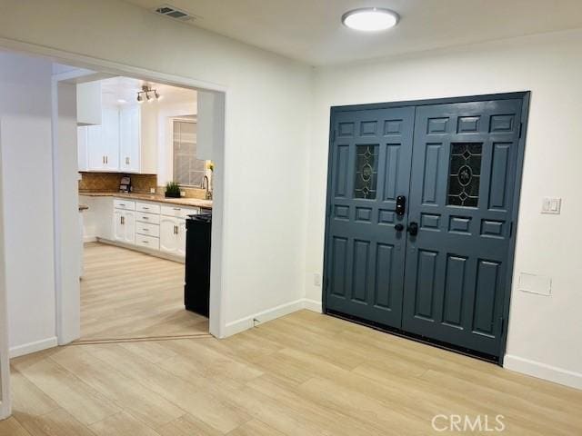 entryway featuring light hardwood / wood-style flooring