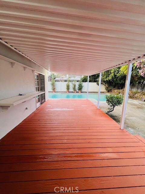 deck with a swimming pool