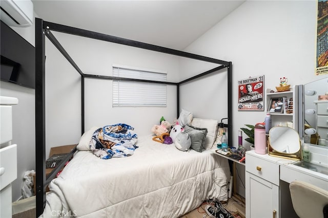 bedroom with a wall mounted AC