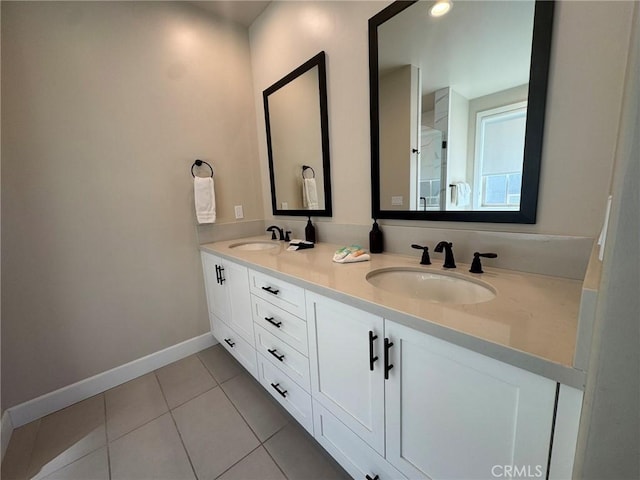 bathroom featuring vanity and tile patterned flooring