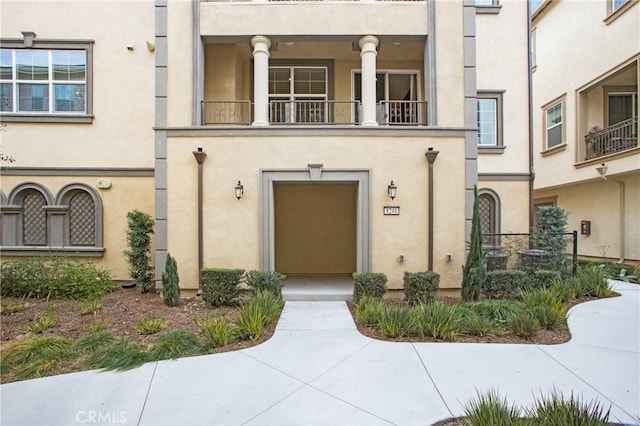 doorway to property with a balcony