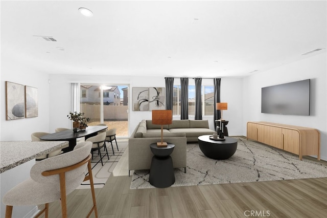 living room featuring light hardwood / wood-style floors