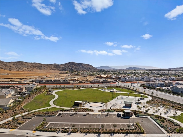 birds eye view of property featuring a mountain view