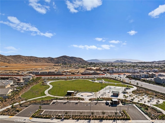 drone / aerial view with a residential view and a mountain view