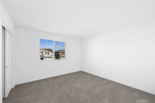 view of carpeted spare room