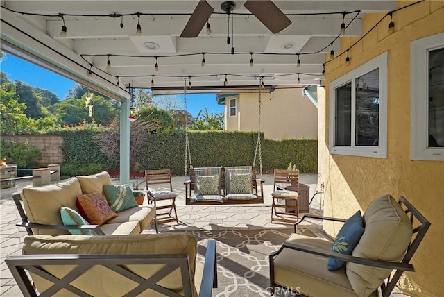 view of patio featuring ceiling fan and an outdoor hangout area