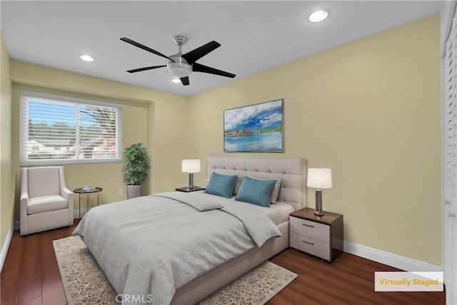 bedroom featuring dark wood-type flooring and ceiling fan