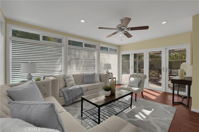 living room with ceiling fan, hardwood / wood-style floors, and french doors