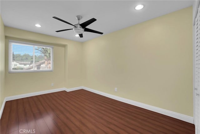 unfurnished room with ceiling fan and hardwood / wood-style floors