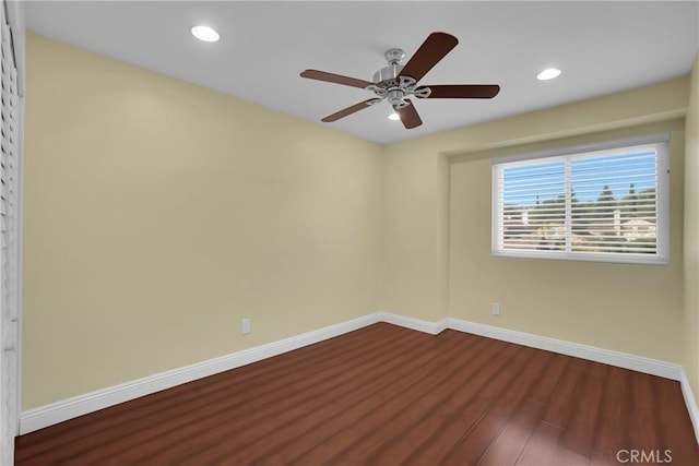 unfurnished room with ceiling fan and hardwood / wood-style floors