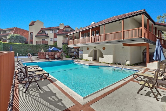 view of pool with a patio area