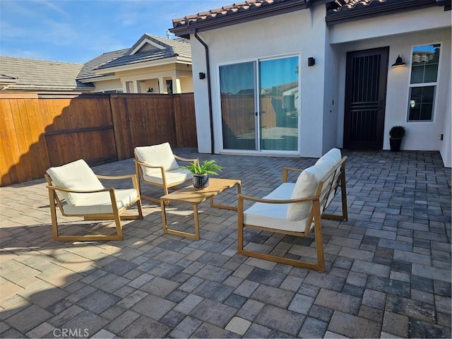 view of patio with fence