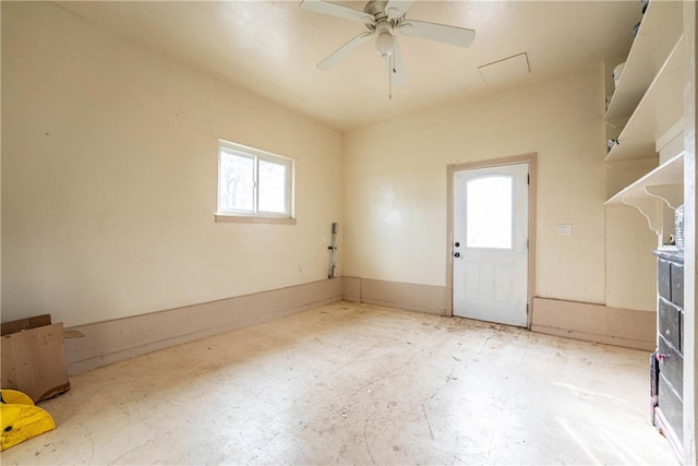 interior space featuring ceiling fan