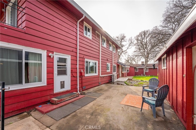 view of property exterior featuring a patio