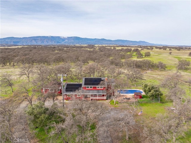 drone / aerial view with a rural view and a mountain view