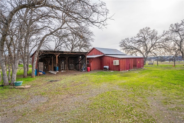 view of outdoor structure featuring a yard