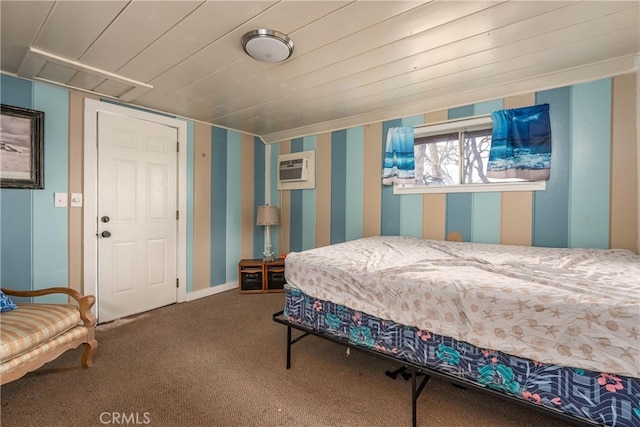 carpeted bedroom featuring an AC wall unit